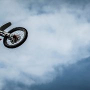 Motocross racek doing extreme jump